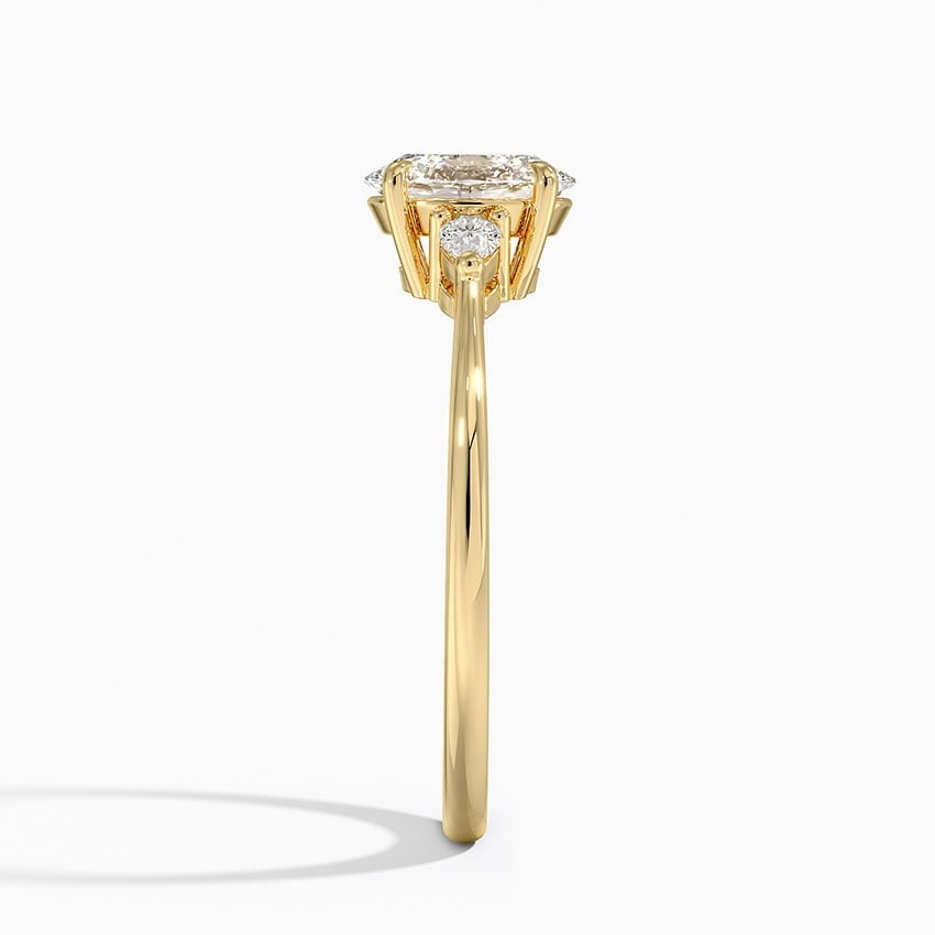 Nebula 6-Prong Pear Three Stone Moissanite Engagement Ring Yellow Gold